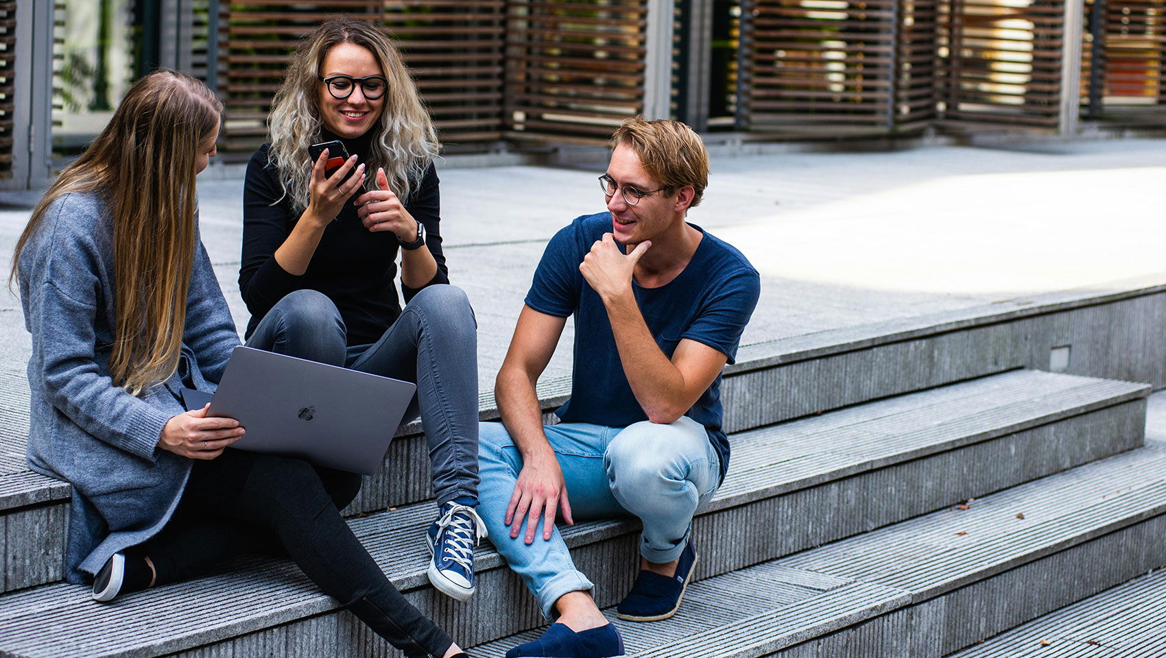 Students talking on steps